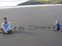 Hi Sam written in the sand by Jim and Arlo